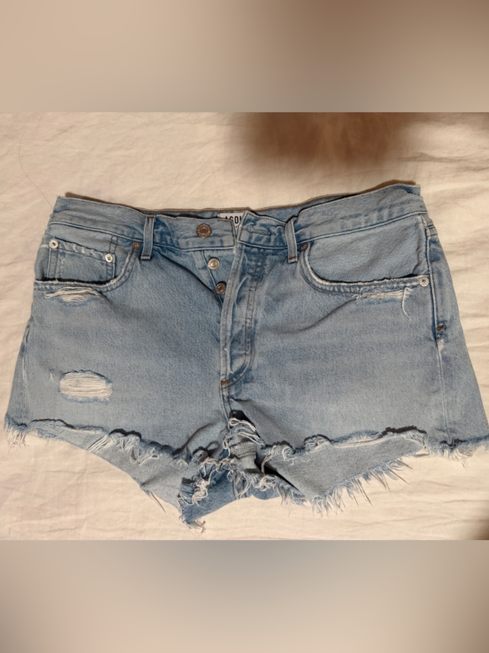 Agolde Light Blue Distressed Denim Cutoff Shorts